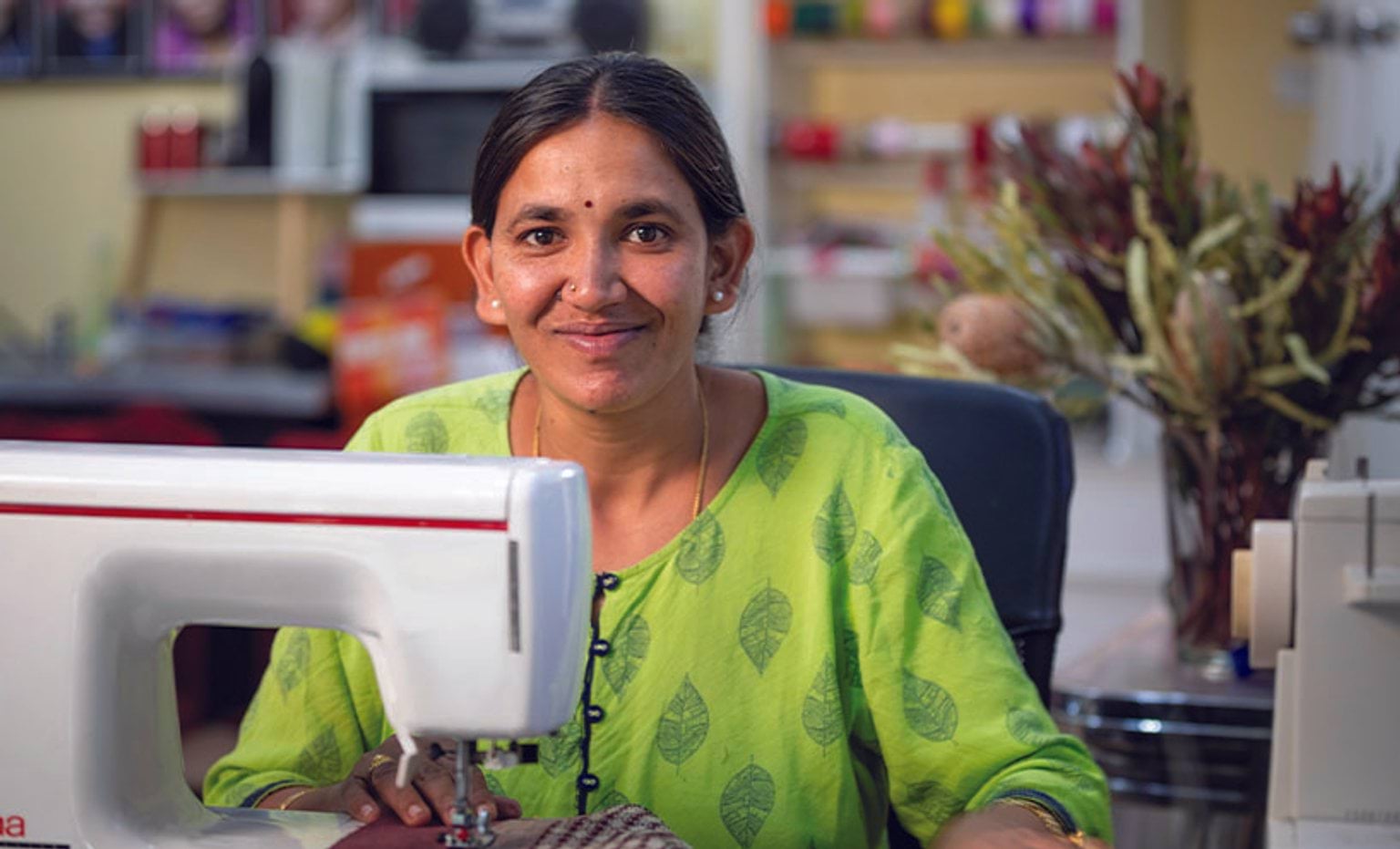 Paw Po Products female staff member sewing Paw Po Products female staff member sewing