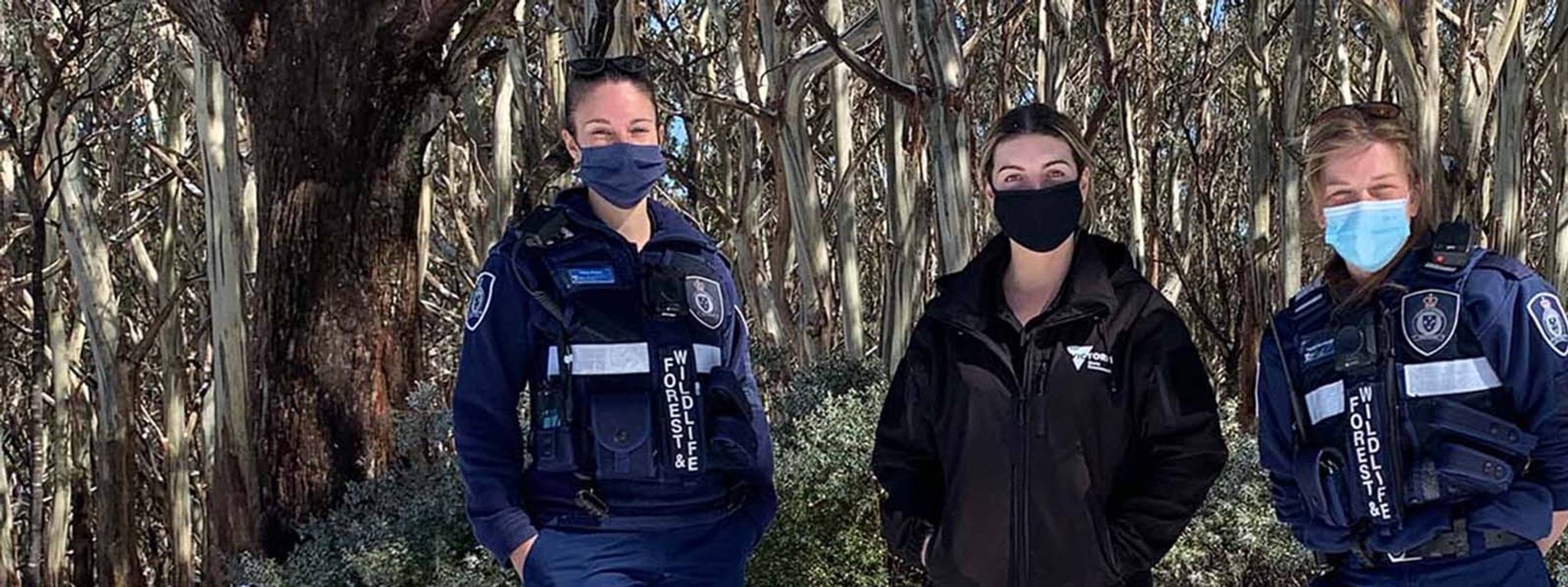 About us Image of wildlife officers standing together smiling
