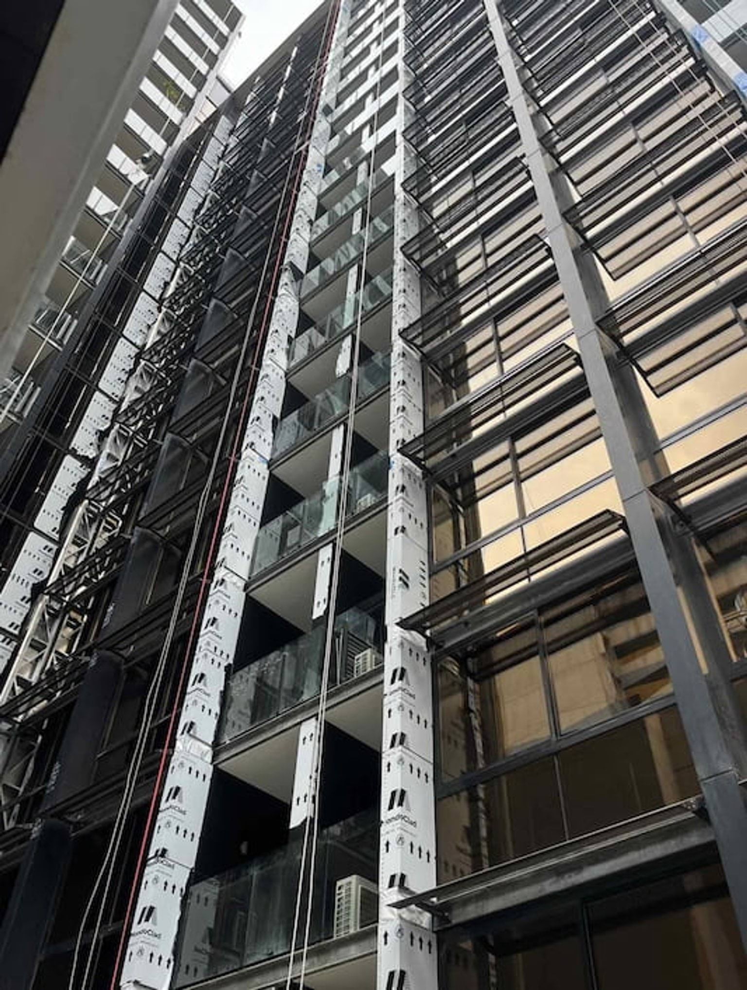 A high rise apartment building undergoing cladding rectification 