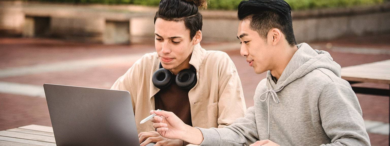 Two students with laptop