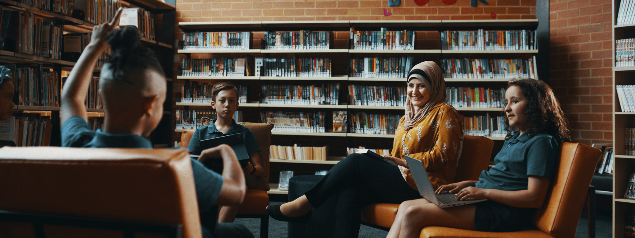 Teacher in library with students Teacher in library with students