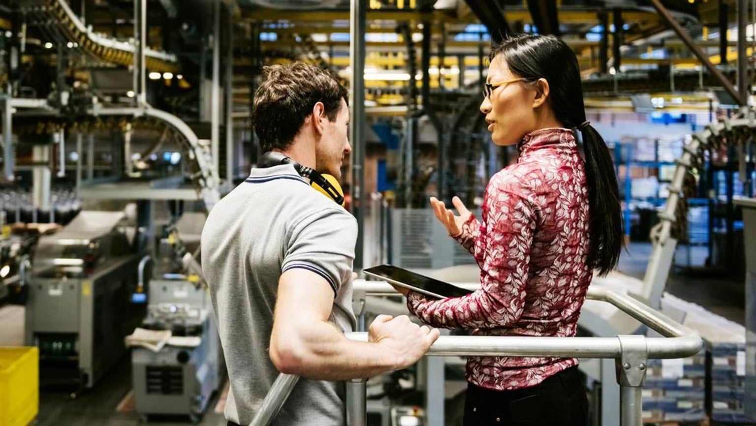 Victorian Recycling Infrastructure Plan 2024 Female engineer and male mechanic talking in factory