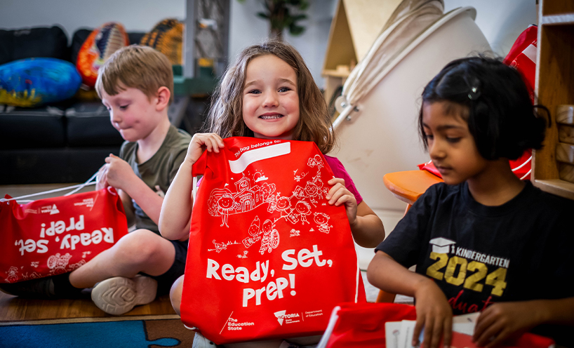 Children holding prep bags