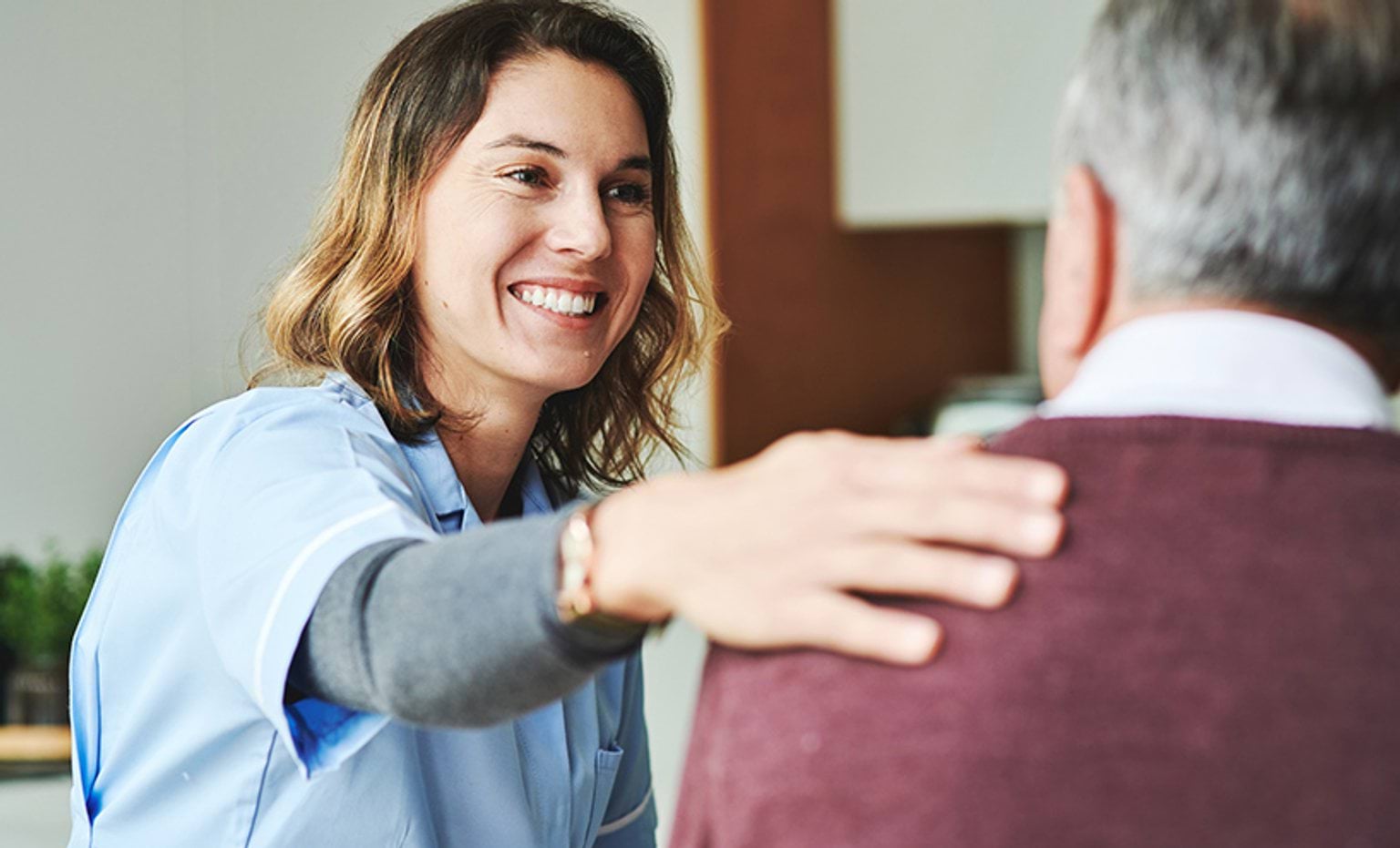 Bendigo Allied Health worker talking to a client